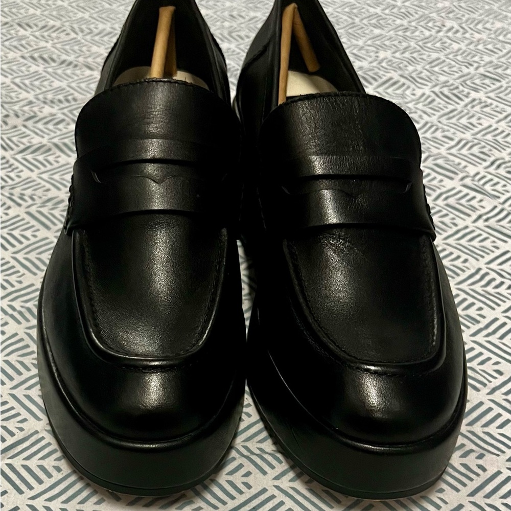 Sleek Black Slip-On Loafers with Leather Finish